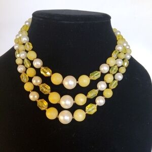 Vintage Hong Kong three strand beaded necklace.
